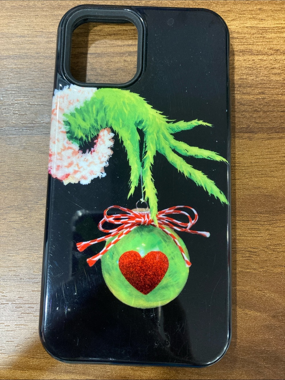 Black Phone Case with Green Ornament and Red Heart Accent